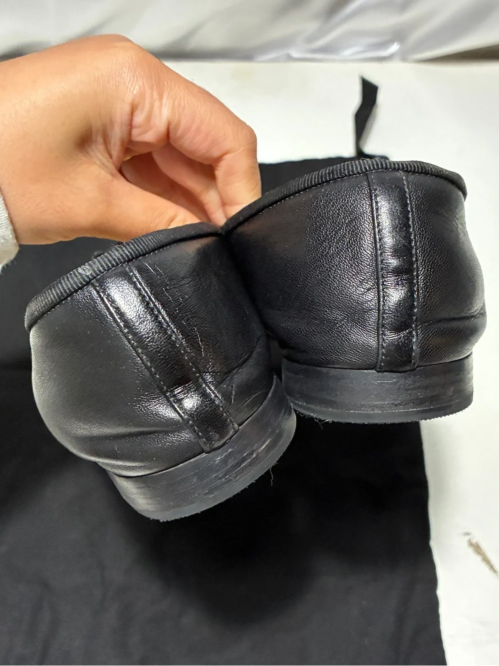 CHANEL Black Leather Cap-Toe Ballet Flats with CC Logo